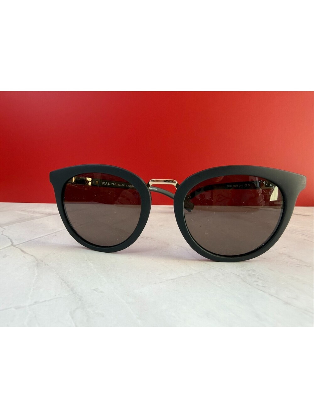 Ralph by Ralph Lauren RA5207 105873 Sunglasses Matte Black Gold Bridge Grey Lens
